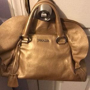 Gold Prada nappa bag